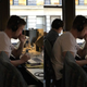 Image: Christina Warren/Gizmodo On the left is a photo without the portrait mode enabled. On the right, you can see Portrait mode. Notice that the building in the background is fuzzier, while Bryan and William remain in focus.